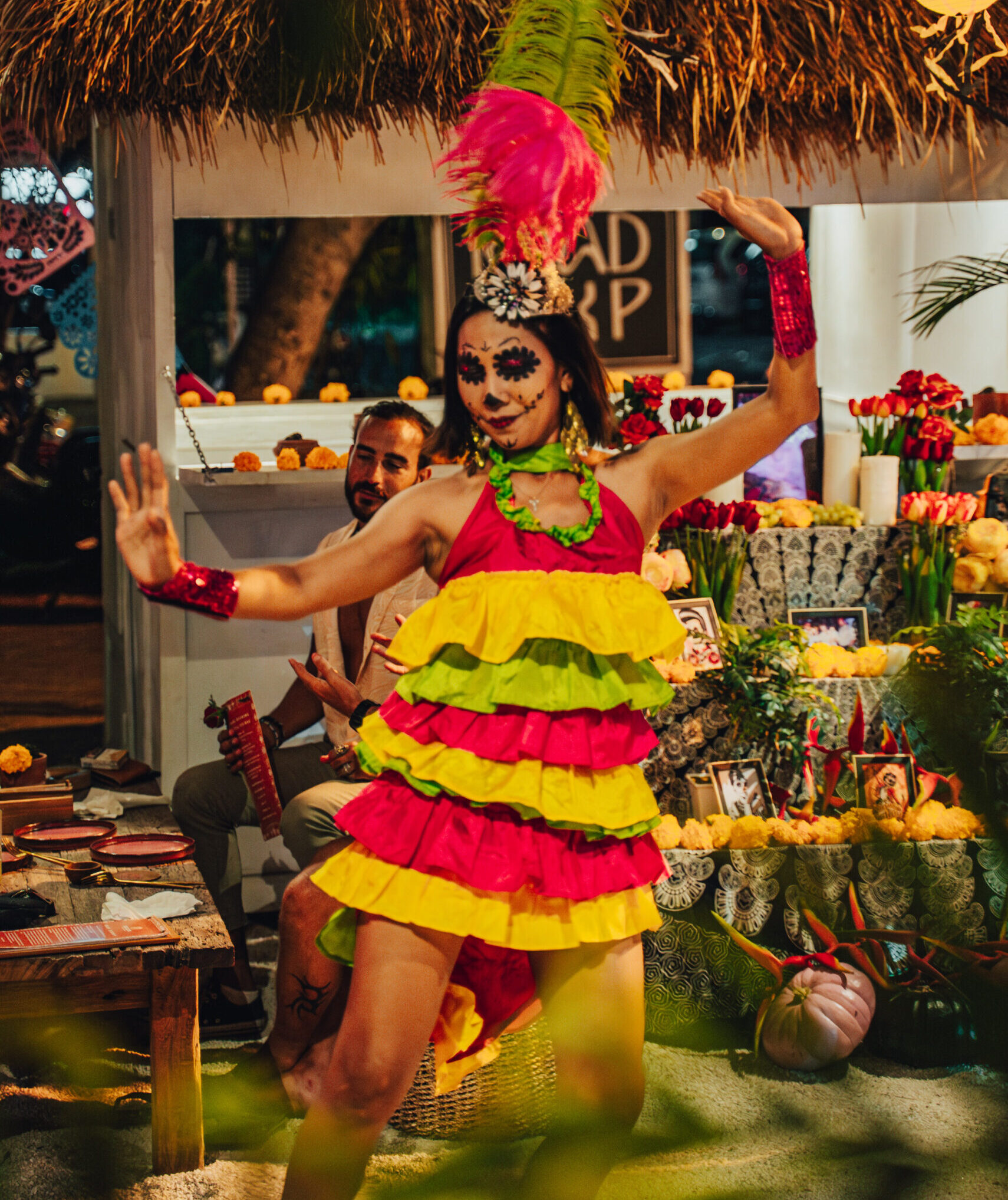 Dancer with Calavera makeup celebrating Día de Los Muertos at Sayulita Tacos & Tequila Bar, Bali.